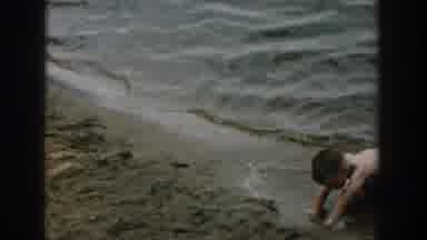 Wisconsin USA (1957): Children On Beach Being Called Out Of Water Because Of