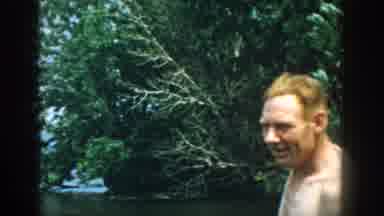 Wisconsin USA (1957): The Child Is Trying To Swimming In The Sea Wear Dressing