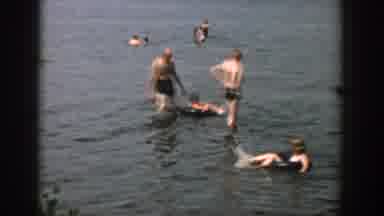 Wisconsin USA (1957): Group Of People Are Enjoying Swimming In A Small Lake