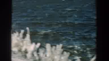 Wisconsin USA (1957): Random Boat In The Middle Of The Lake With Man On It