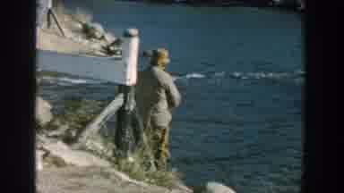 Wisconsin USA (1957): A Man Fishing At The Blue Ocean For Fish