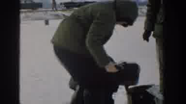 Wisconsin USA (1957): The Video Shows A Person Playing In The Snow With A Child