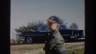 Michigan USA (1958): Kid With Baseball Bat Playing In Garden Being Happy