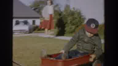 Michigan USA (1958): Two Kids Having Fun In The Garden