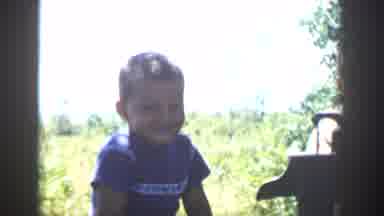 Michigan USA (1958): Boy Drinking From Glass Jar