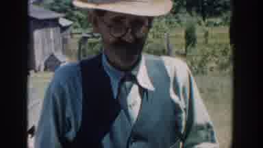 Michigan USA (1958): Grandfather Picking Vegetables With His Grandchildren And