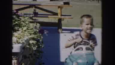 Michigan USA (1958): Boy Playing Small Toy Car On Cheerful Sunny Day Outdoors