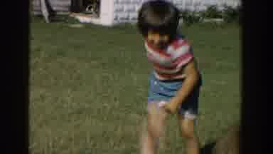 Michigan USA (1958): Children Play Near White Brick Garden Shed With Open Door