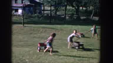Michigan USA (1958): Old Footage Three Young Children Running Around Yard With Red