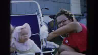 Michigan USA (1958): Three Members Are Playing With A New Born Baby