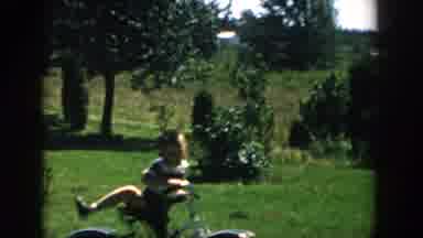 Michigan USA (1958): Kid Falling Off Bicycle