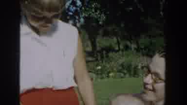 Michigan USA (1958): Mother And Baby In A Beautiful Garden With A Blond Little