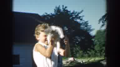 Michigan USA (1958): Playful Kittens Outside Handling By Teenager