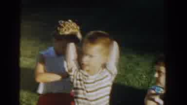 Michigan USA (1958): Four Children Outside Petting Baby Kitties On A Sunny Day