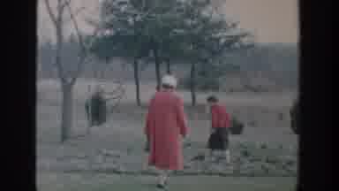 Michigan USA (1958): Two Ladies And Two Children Are Searching Something In A