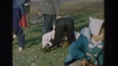 Michigan USA (1958): Small Children In Jackets And Hats Perform Somersaults In The