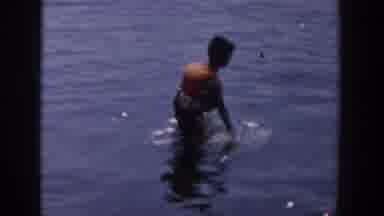 Wisconsin USA (1958): Young Kids Swimming In The Lake With Life Preservers On