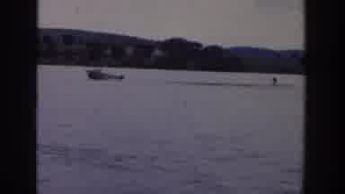Wisconsin USA (1958): Man Water Skiing In Lagoon At Medium Speed On Pleasant Sunny