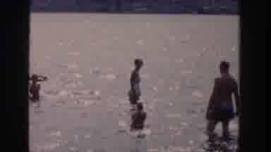 Wisconsin USA (1958): Adults And Kids Enjoying Their Time In The Water In A