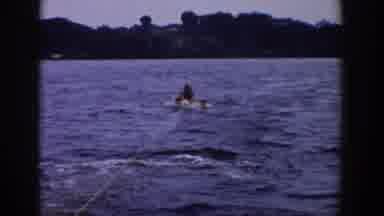 Wisconsin USA (1958): Man Walks With Water Skiing On Beautiful Lake In Nice Sunny