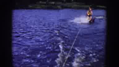 Wisconsin USA (1958): One Person Skating In The Water And Another Person Capturing