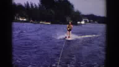 Wisconsin USA (1958): Water Boarding On Lake In The Summer And A Little Boy And