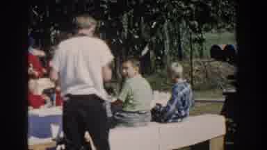 Wisconsin USA (1958): People Are Gathered In A Common Places And Talking About