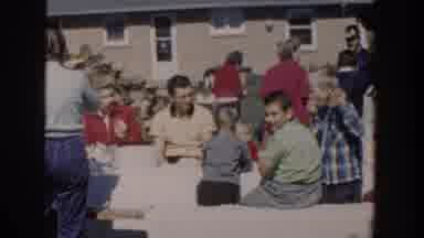 Wisconsin USA (1958): Family Gathering On The Lawn On A Beautiful Sunny Day
