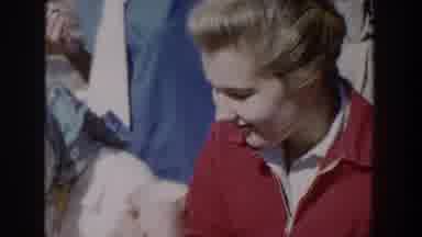 Wisconsin USA (1958): Family Eating Outdoors, Woman Drinking From Cup, Child Using