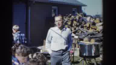 Wisconsin USA (1958): Mans Walks Around And Two Women Greet Each Other Outside
