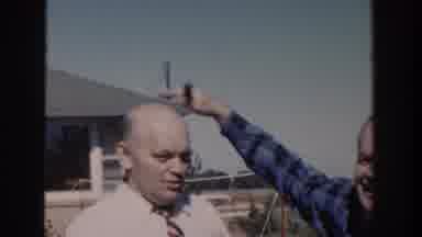 Wisconsin USA (1958): Two Bald Men Patting Their Heads In The Sunshine
