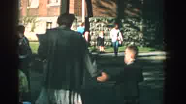 Wisconsin USA (1964): One Women And Her Son Going To The School