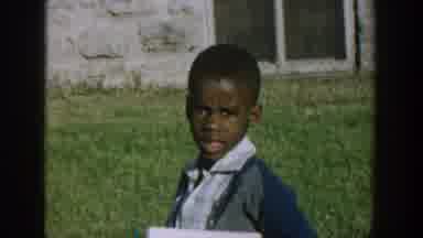Wisconsin USA (1964): A Little Boy Is Looking As Another Boy And His Parents Are