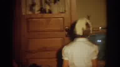 Wisconsin USA (1964): The Girl Is Standing Near The Television After Few Second