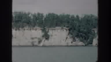 Wisconsin USA (1964): Beautiful Expansive Raged Rock Bluff Near Water Filled With