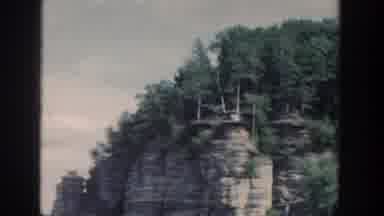Wisconsin USA (1964): Steep Cliffs At Waters Edge With Tour Boats Nearby