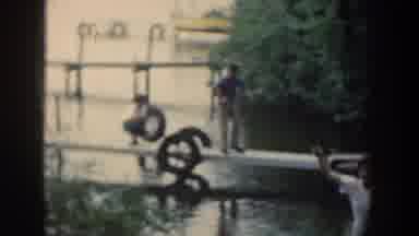 Wisconsin USA (1964): Kids Fishing On A Lake And Running On An Hill