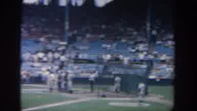 New York USA (1964): Batter In Batting Cage Swinging, Pitcher Throws The Ball,