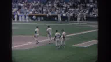 New York USA (1964): Four Baseball Players Standing In Right Field As They Watch A