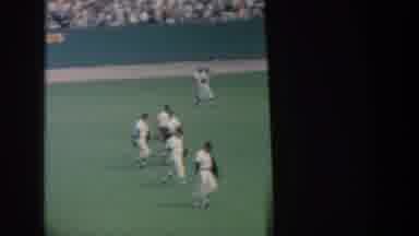 New York USA (1964): Baseball Players Walk Across Field As Ball Falls Into