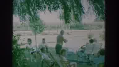 New York USA (1964): Family Picnic In A Open Green Space With Watermelon And A Nun