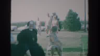 New York USA (1964): People Relax On Lawn Chairs Outside And Kids Play Close by