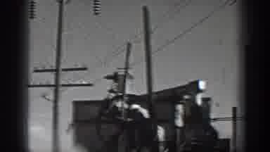 California USA-1936: Shaky Black And White Footage Of Town Street And Industrial Machinery