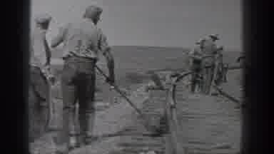 California USA (1936): Black And White Footage Of Men Working On Railroad Tracks