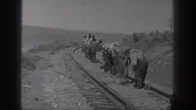 California USA (1936): Railroad Workers Clearing Tracks By Hand In The Early Days,