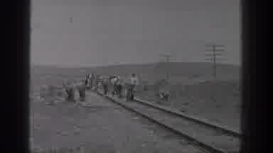 California USA (1936): Railroad Workers Working Hard