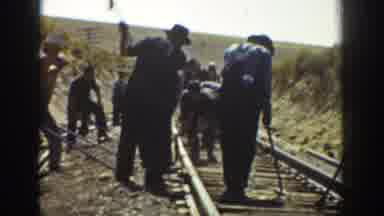 California USA (1936): Work Men Doing Their Work In A Railway Track Showing Near
