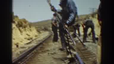 California USA (1936): Men Working On Railroad