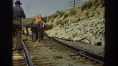 California USA (1936): Railroad Workers Pulling Up The Track