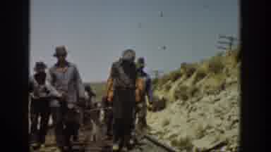 California USA (1936): Hard Working Men Walking By The Railway And Building Metal